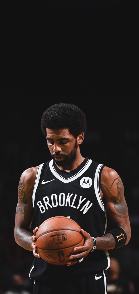 Kyrie Irving dribbling a basketball during a professional game